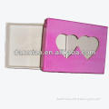 Pink cardboard gift box with heart window